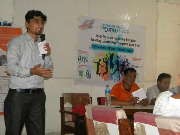 Madan Poudel speaking during the Youth forum in Nepal on Agriculture Education: Providing Opportunities, Preventing Brain drain