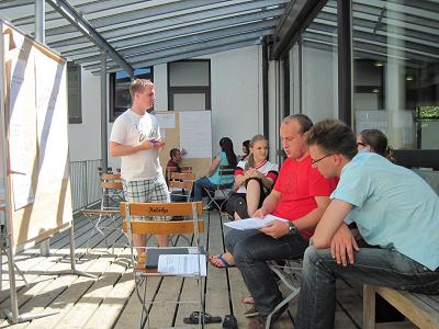 Participants from Germany, Brazil and Austria discuss about education of rural youth during the 26th International Leadership Workshop for Rural Youth  - YPARD 