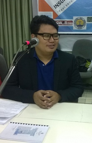 Joshua during a radio interview as a student in agriculture