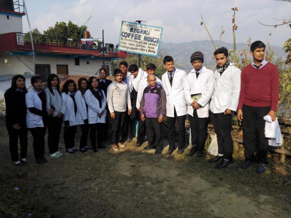 Arun Lamsal is the one with green tracksuit with students of B. Tech III year after coffee processing visit